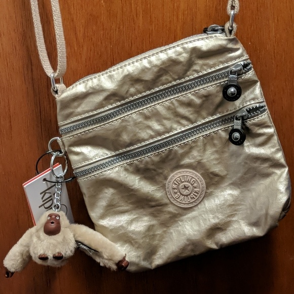 kipling gold metallic